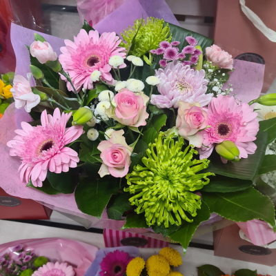 Warm Wishes - Send this vibrant hand-tied featuring a mix of favourite flowers delivered in a delightful gift bag or box is the perfect way to send your thoughts.